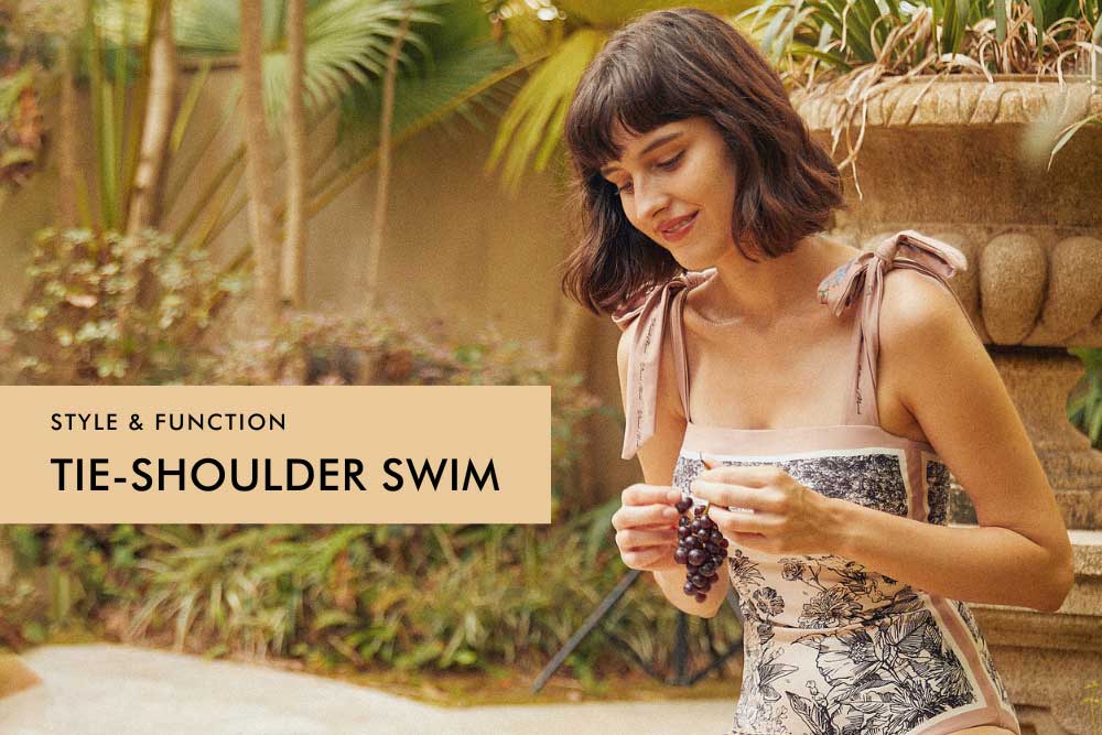 Girl wearing tie-shoulder one piece swimsuit